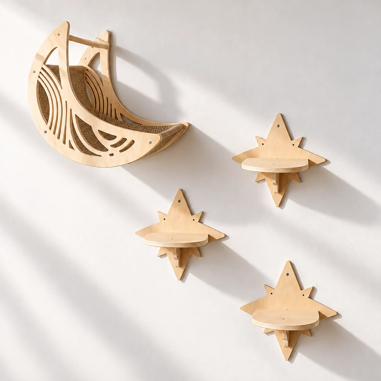 Pale wooden crescent wall bed with a brown woven insert and three starburst-backed cat steps on a light wall